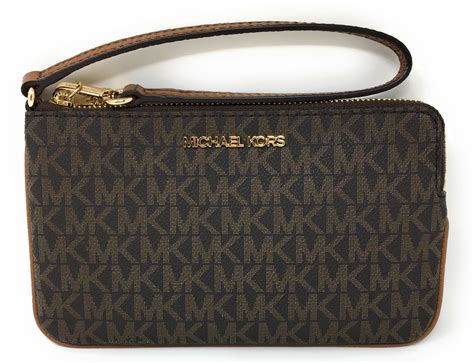 michael kors jet set wristlet sale|jet set large logo wristlet.